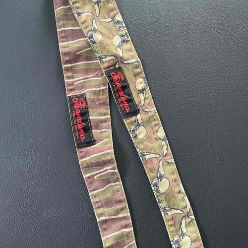Skulls and tiger stripes double tagged Sandana