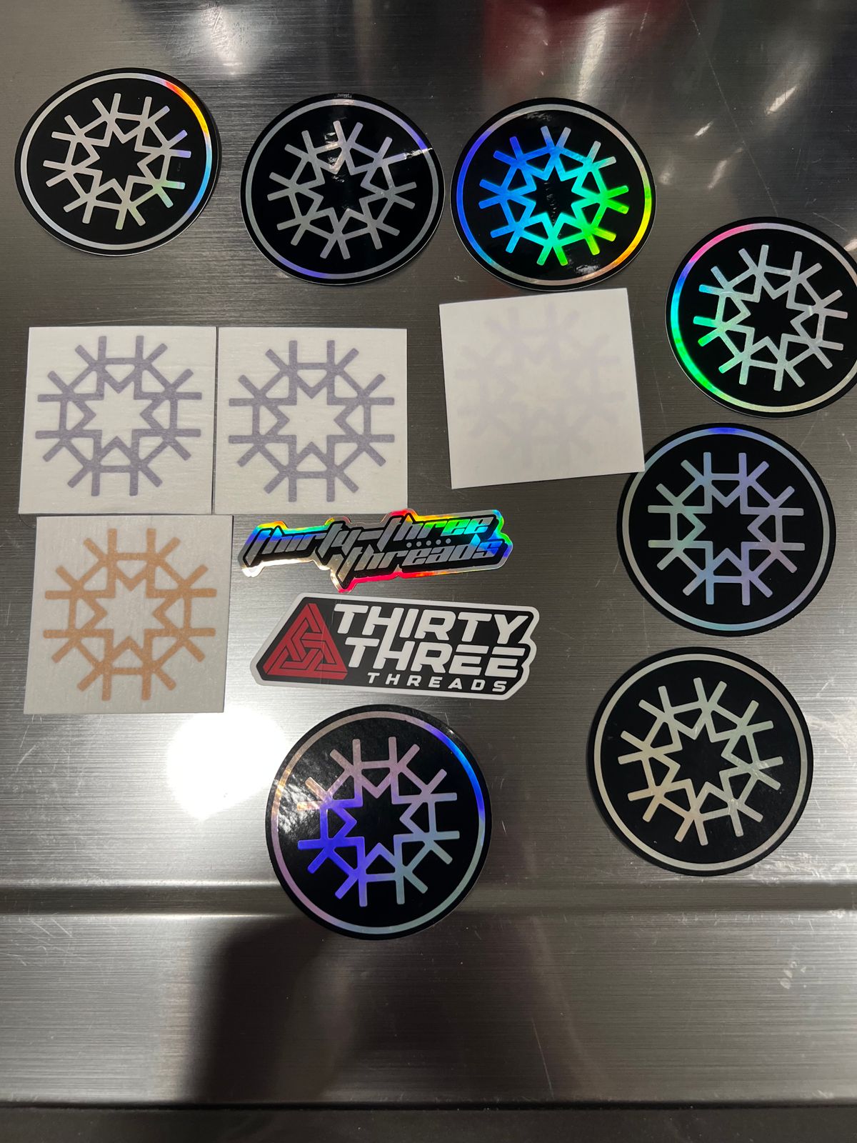 HIRMESIS LOT 13 Stickers, 2 MICRO FIBERS NEW, 1 GOLD KEYCHAIN, 1 REVERSIBLE WRIST BAND NEW! 