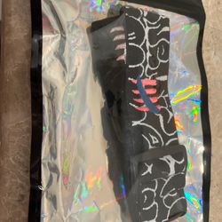 Enemy of the state, graffiti strap, Harley Quinn” New