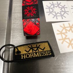 HIRMESIS LOT 13 Stickers, 2 MICRO FIBERS NEW, 1 GOLD KEYCHAIN, 1 REVERSIBLE WRIST BAND NEW! 