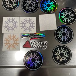 HIRMESIS LOT 13 Stickers, 2 MICRO FIBERS NEW, 1 GOLD KEYCHAIN, 1 REVERSIBLE WRIST BAND NEW! 