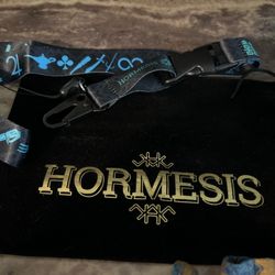 HORMESIS 7 wristbands, 1 black Velvet headband bag, 3 Hormesis pins & 3 Pouches, 1 Micro fiber. 