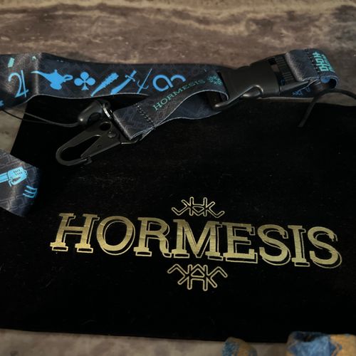 HORMESIS 7 wristbands, 1 lanyard,1 Black Velvet headband bag, 1 Micro fiber. 