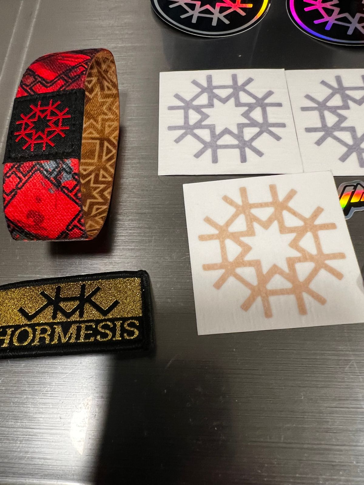 HIRMESIS LOT 13 Stickers, 2 MICRO FIBERS NEW, 1 GOLD KEYCHAIN, 1 REVERSIBLE WRIST BAND NEW! 