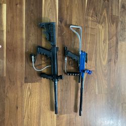 2 paintball markers including a Tippman custom pro and 3 co2 tanks and 2 loaders