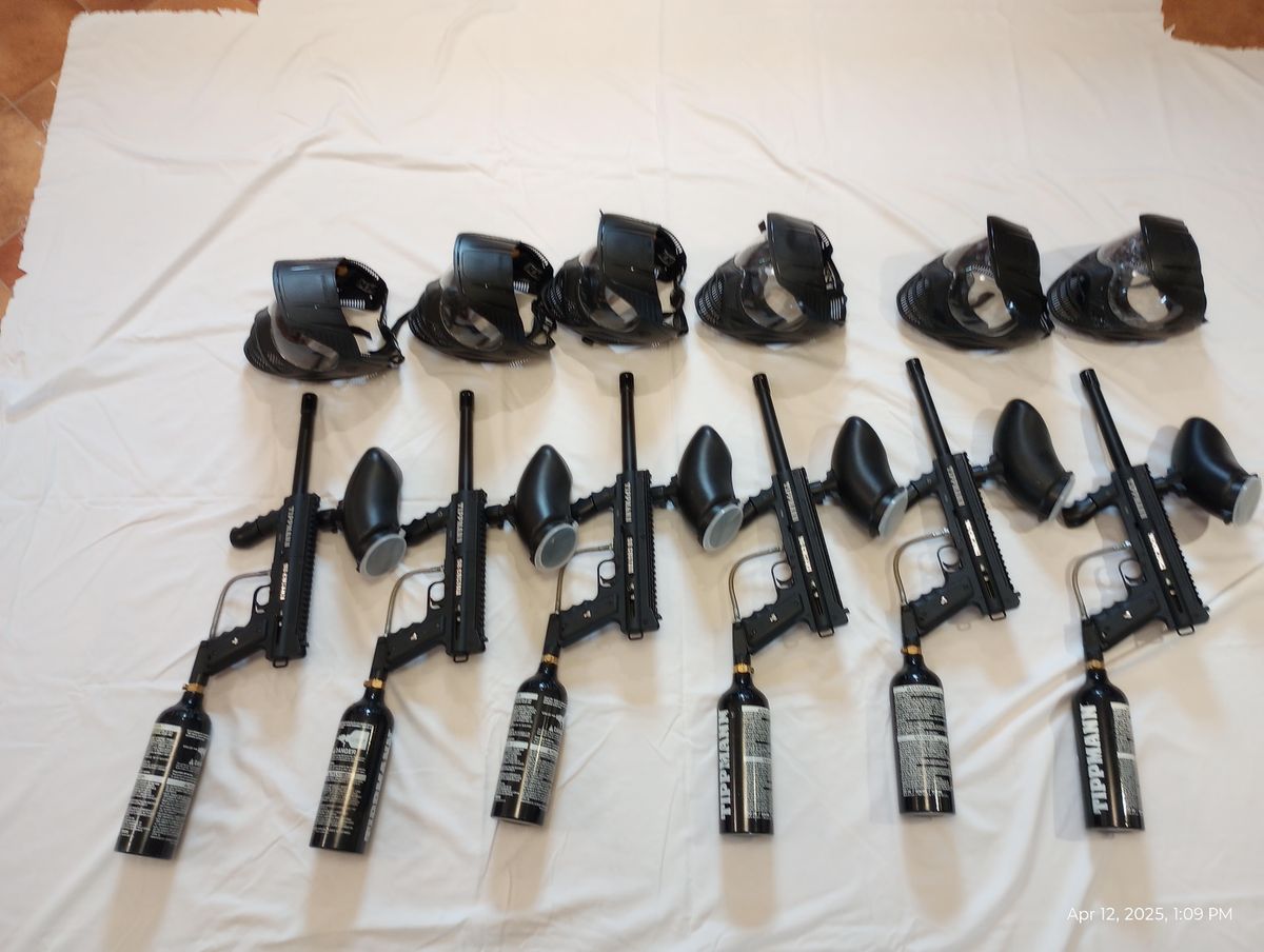 6 Paintball guns, tanks, and helmets