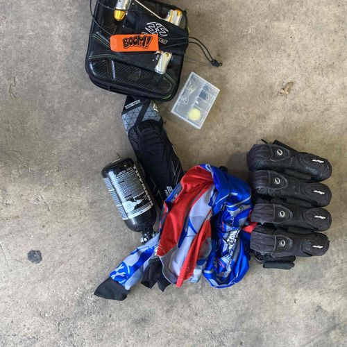 A bunch of paintball gear