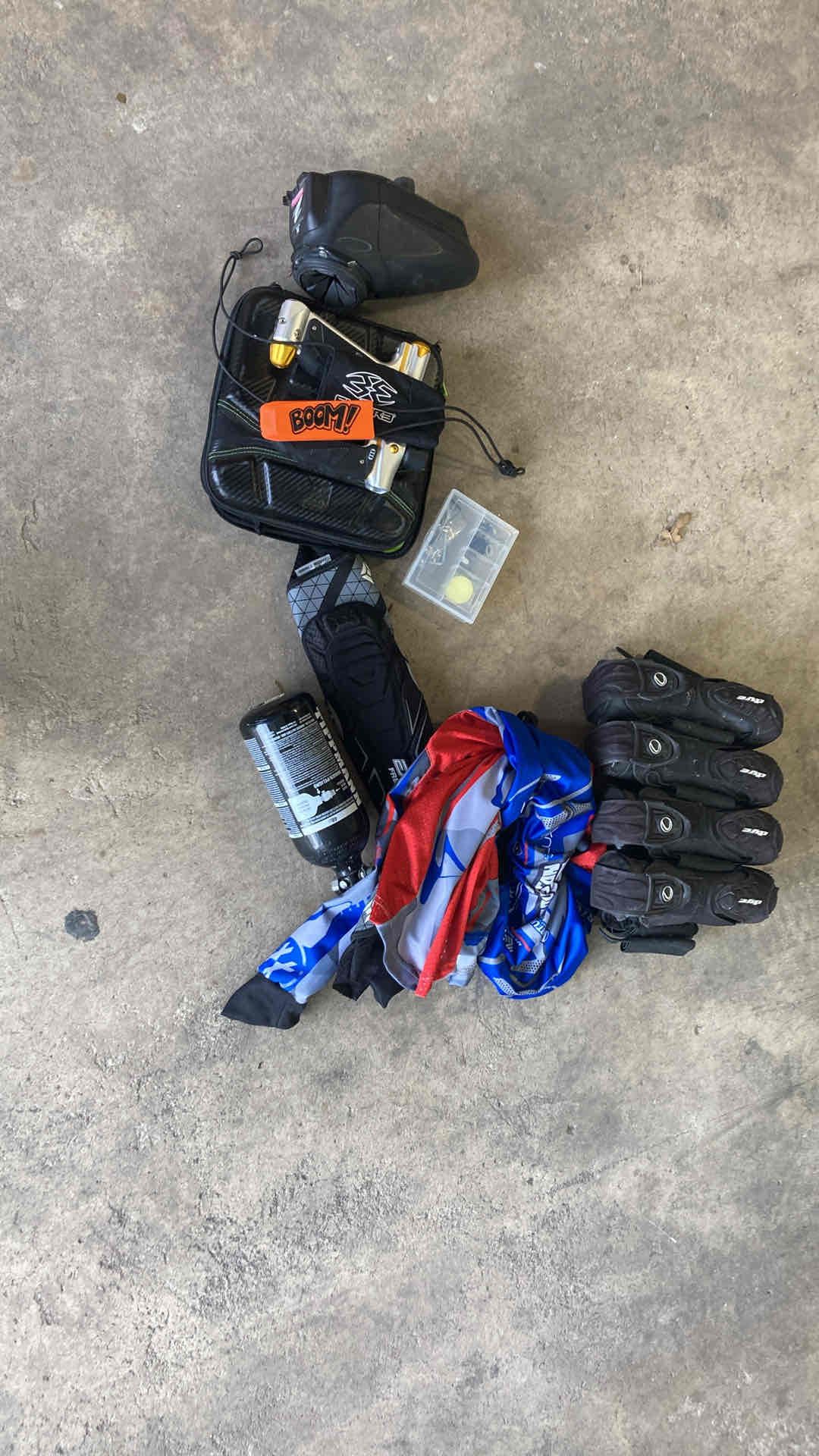 A bunch of paintball gear