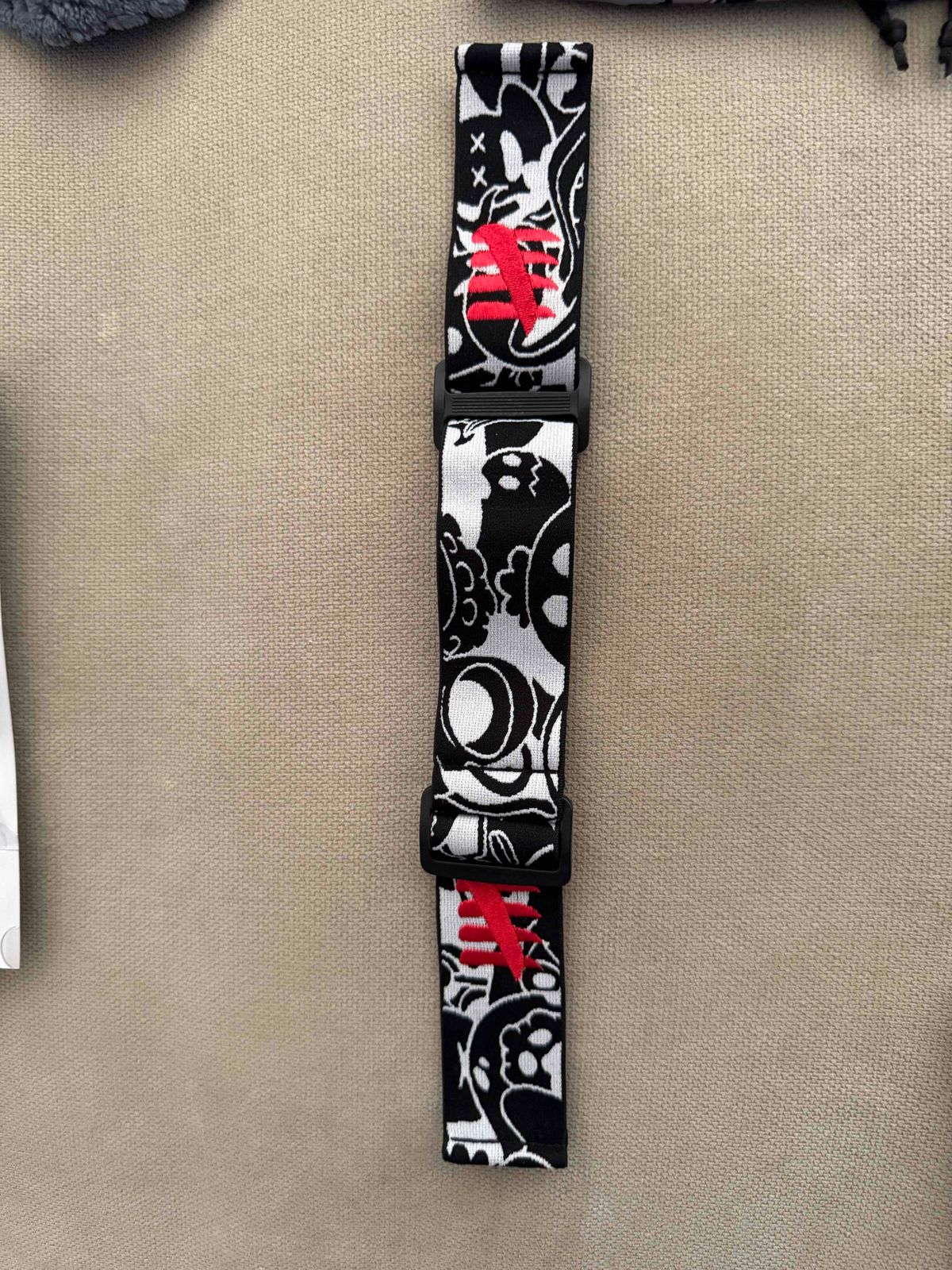 Enemy of the state “coloring book” strap